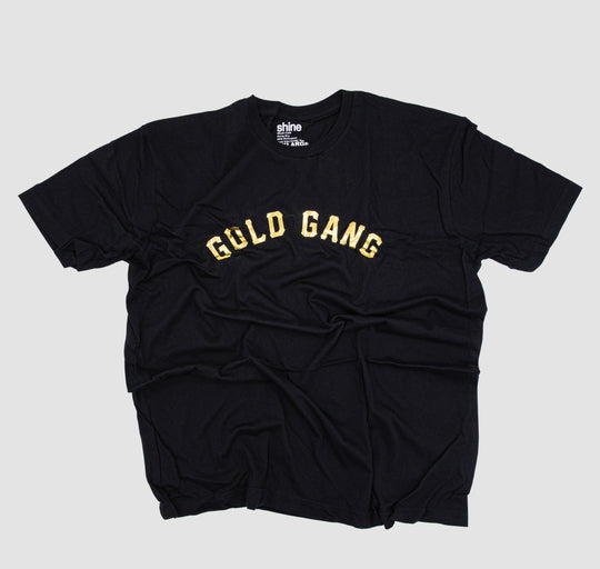Tシャツ・カットソー New Era Originals Name Tag Script T-Shirt Golden Glow V-Emblem Metallic Logo T-Shirt | VERSACE US